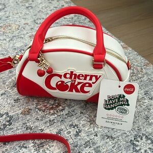 Adorable new with tags Cherry Coke purse